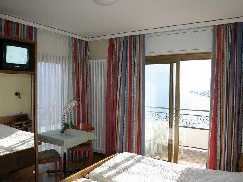 Hotel Geranio Au Lac Muralto Szoba fotó